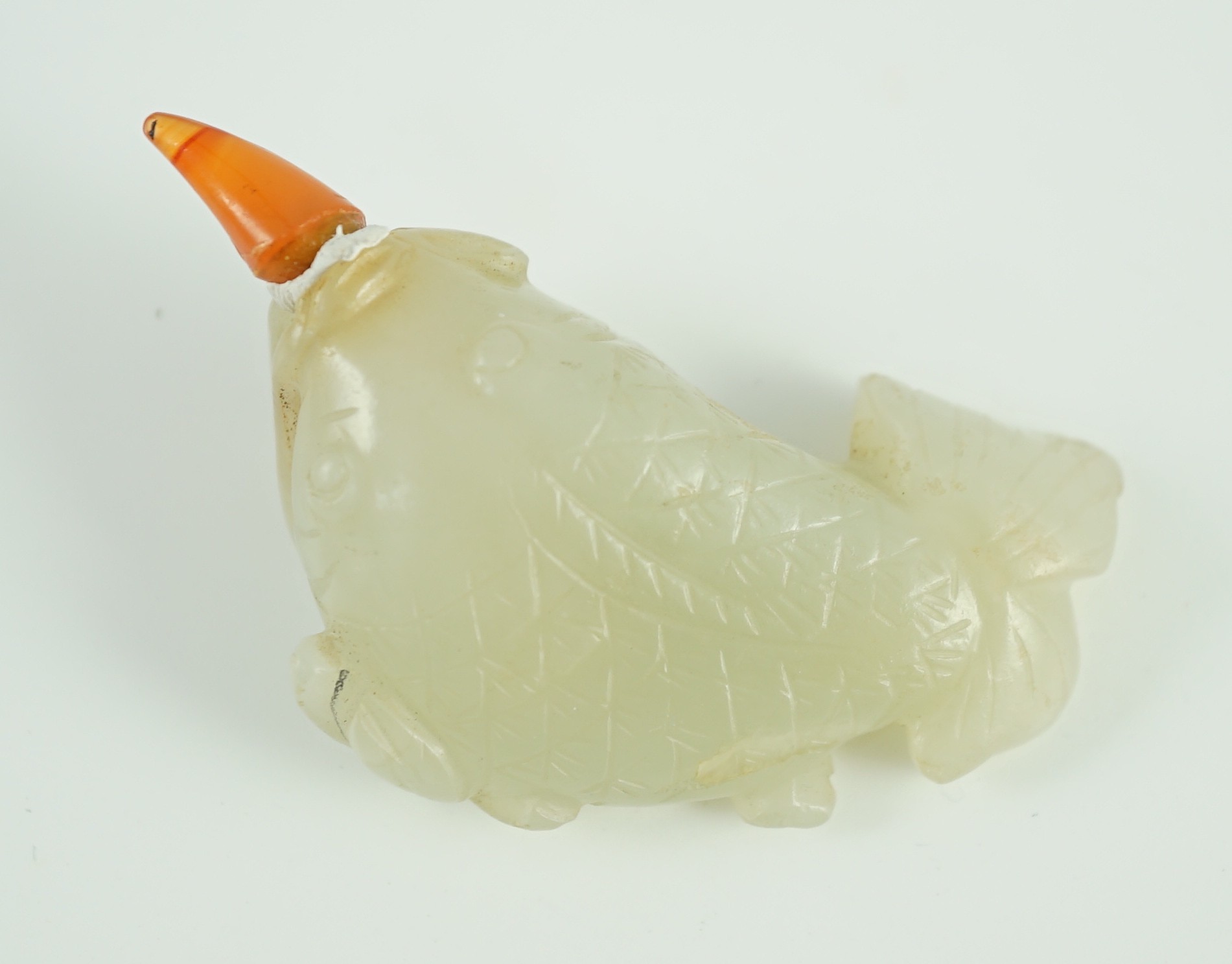 A Chinese pale celadon jade 'fish' snuff bottle, 19th century, 5.3cm long